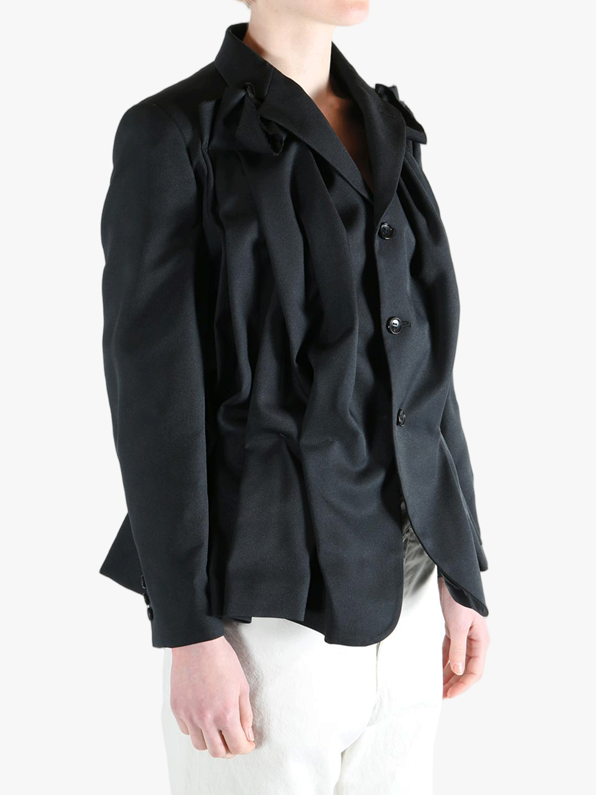 Black jacket worn by a person, showing the jacket's fit