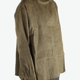 Brown jacket worn by a person, showing the jacket's fit