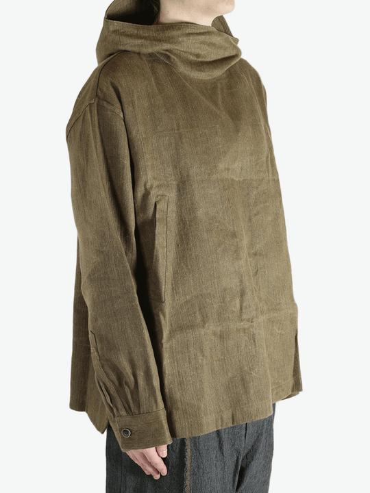 Brown jacket worn by a person, showing the jacket's fit