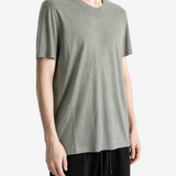 Grey t-shirt worn by a person, showing the t-shirt fit