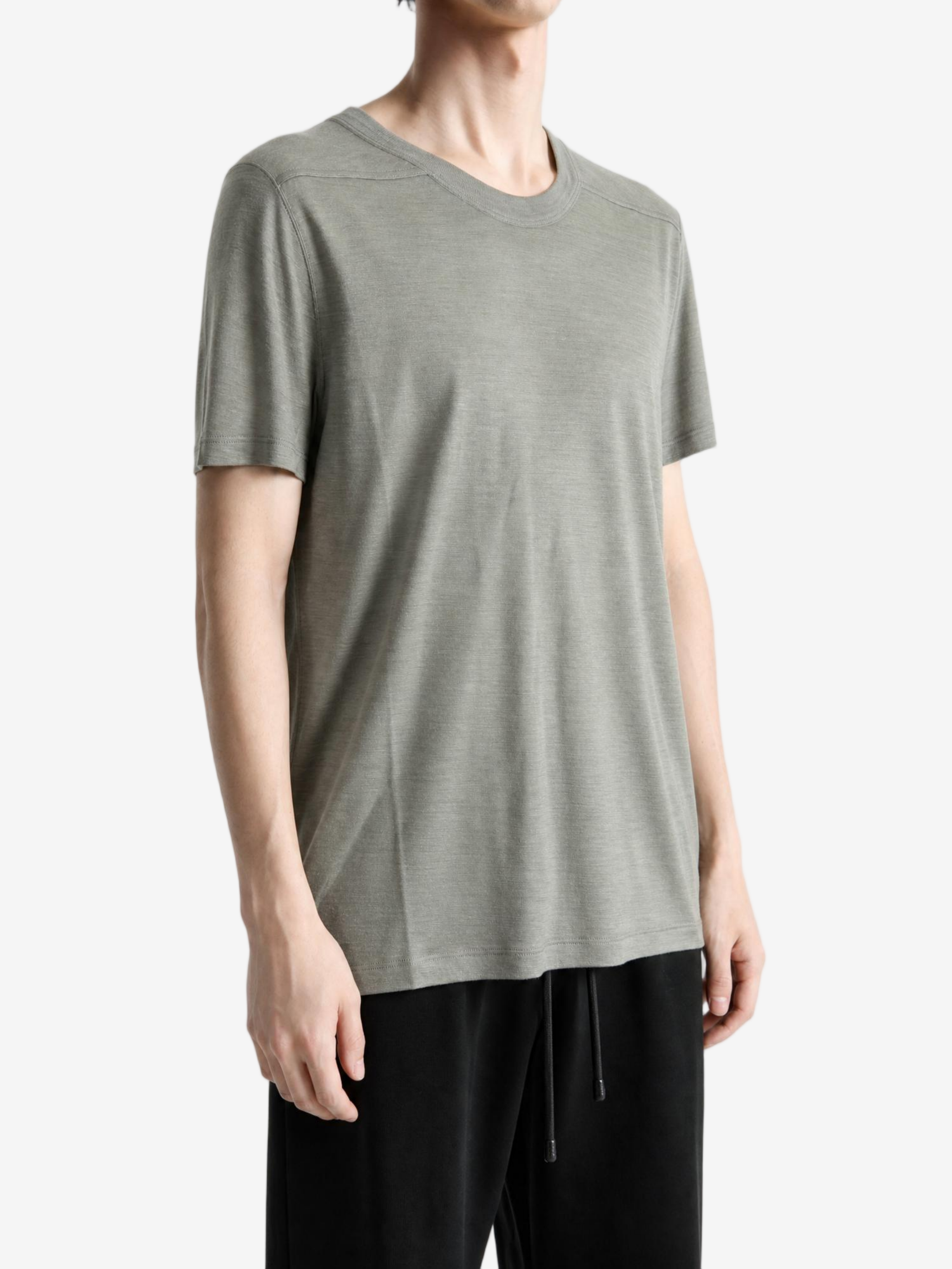Grey t-shirt worn by a person, showing the t-shirt fit
