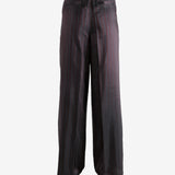 Red pant worn by a person, showing the pant's fit