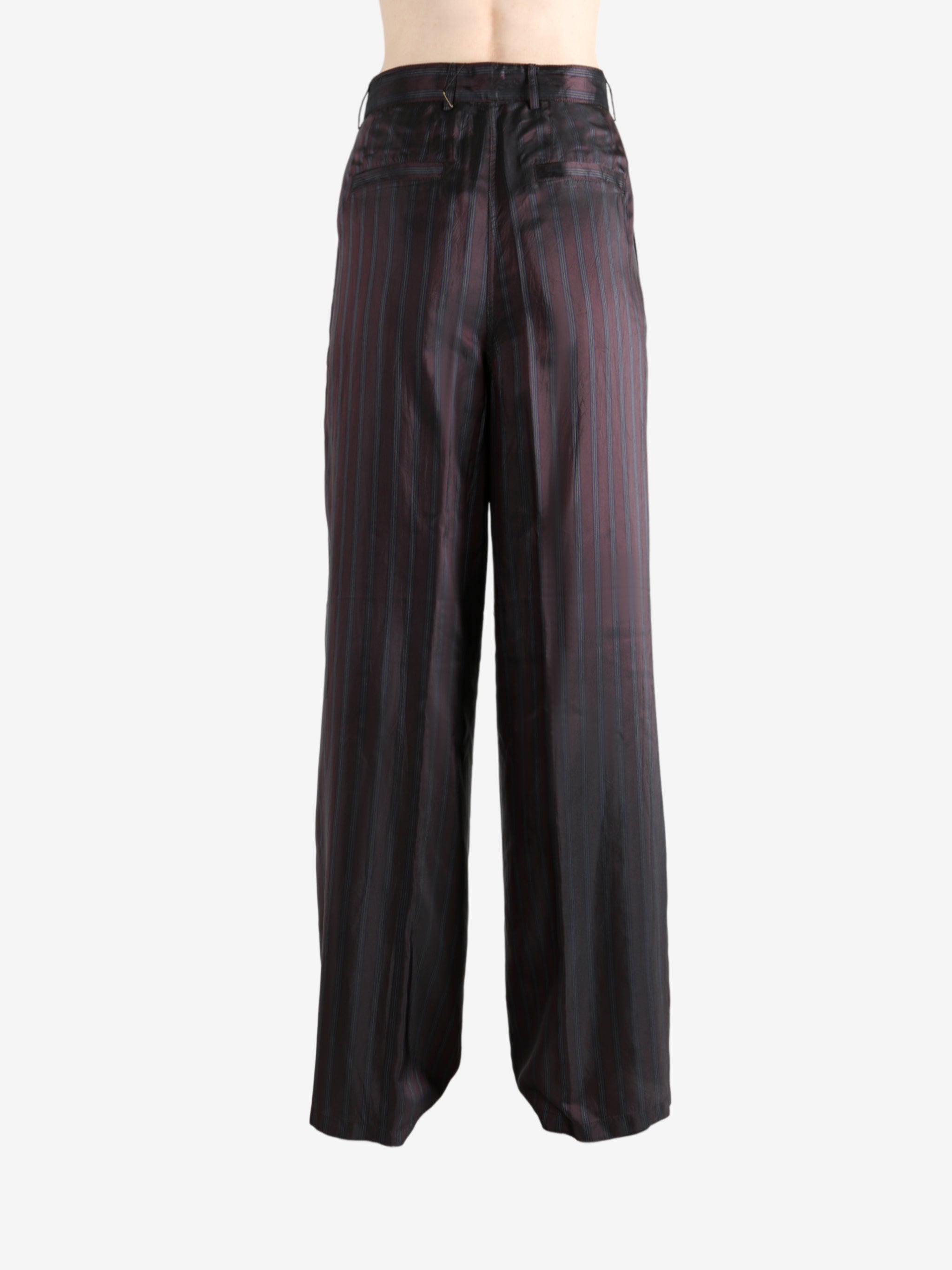 Red pant worn by a person, showing the pant's fit