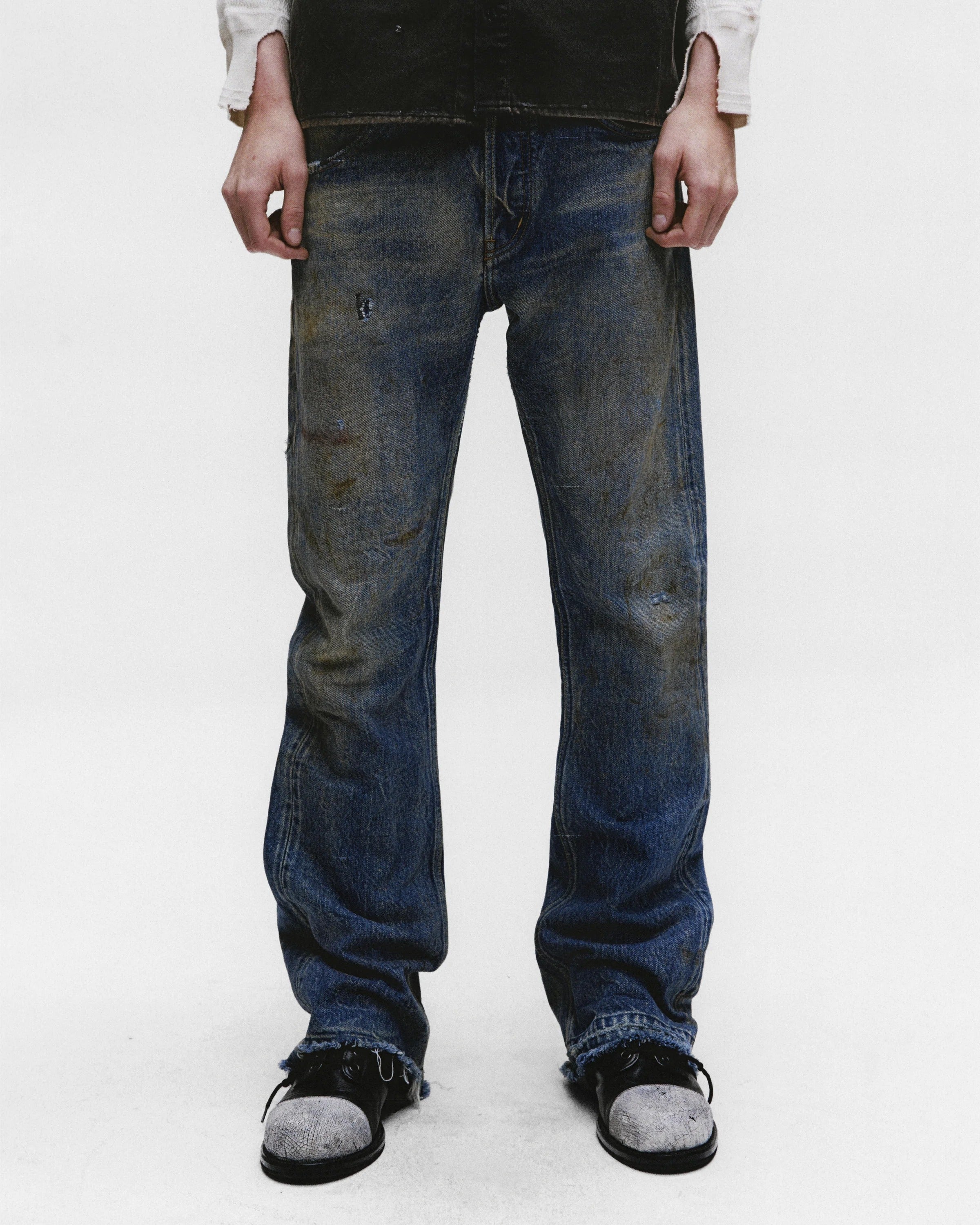 Blue pants worn by a person, showing the pants fit