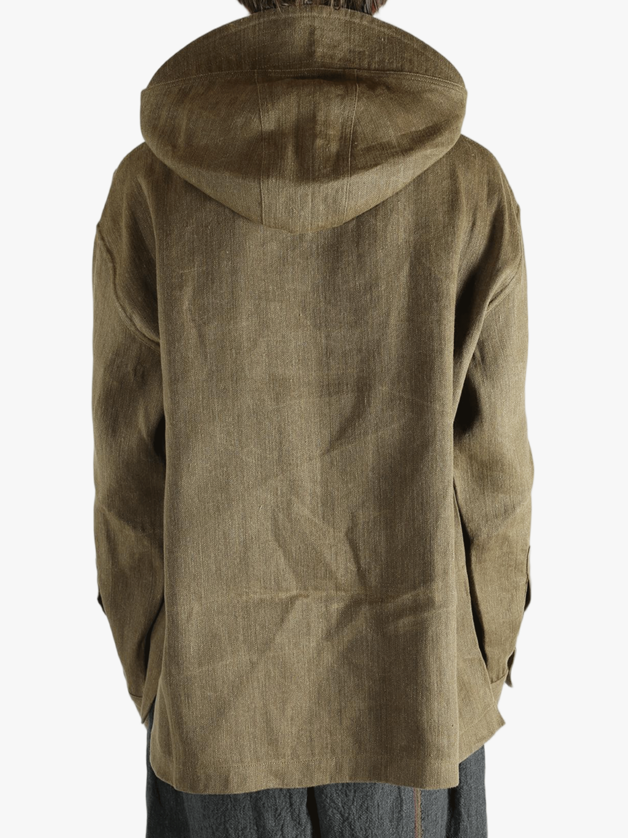 Brown jacket worn by a person, showing the jacket's fit