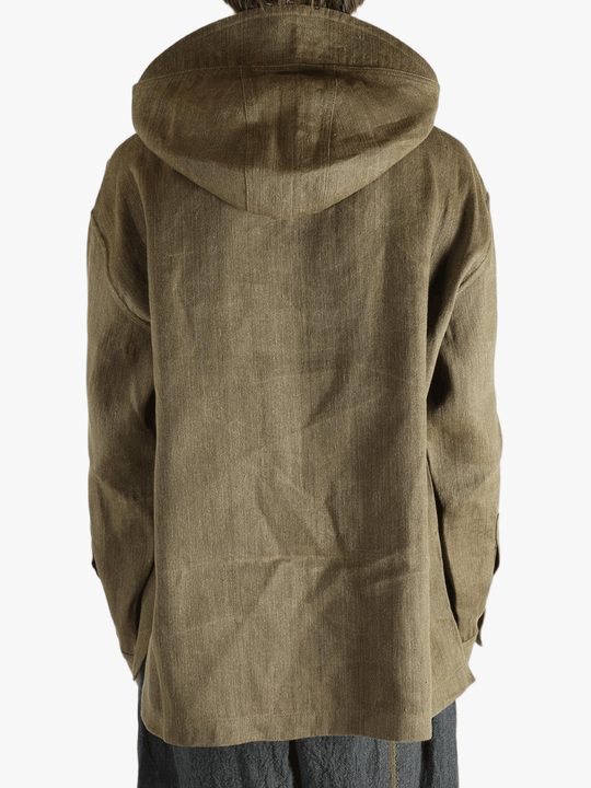 Brown jacket worn by a person, showing the jacket's fit