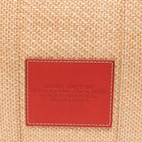 Close up of tan bag, showing texture of calf leather fabric