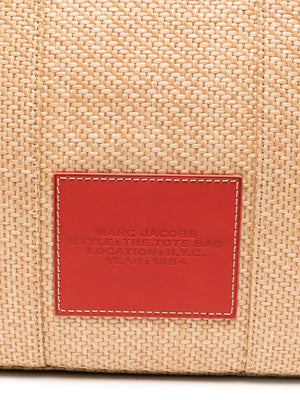 Close up of tan bag, showing texture of calf leather fabric