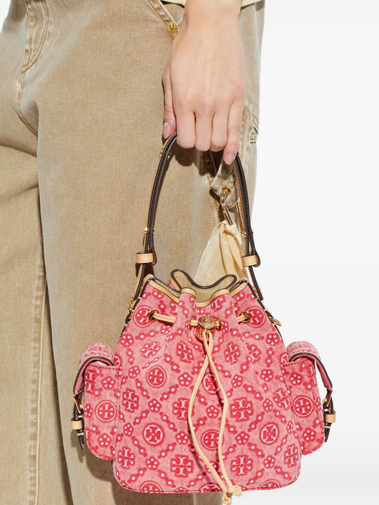 Red bag worn by a person, showing the bag's fit