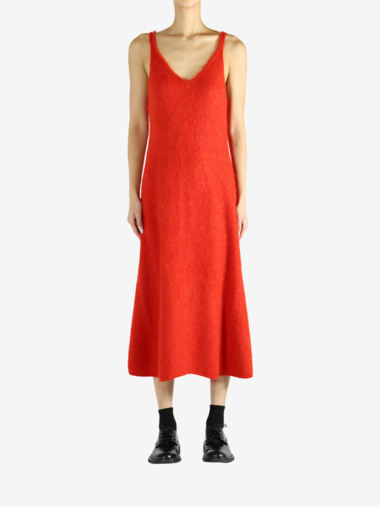 Red dress worn by a person, showing the dress's fit