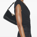 Black bags worn by a person, showing the bgas's fit