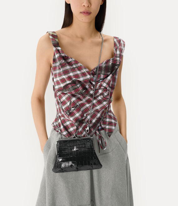 Black bag worn by a person, showing the bag fit