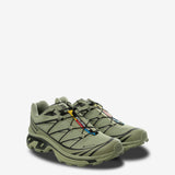 green sneakers, side view