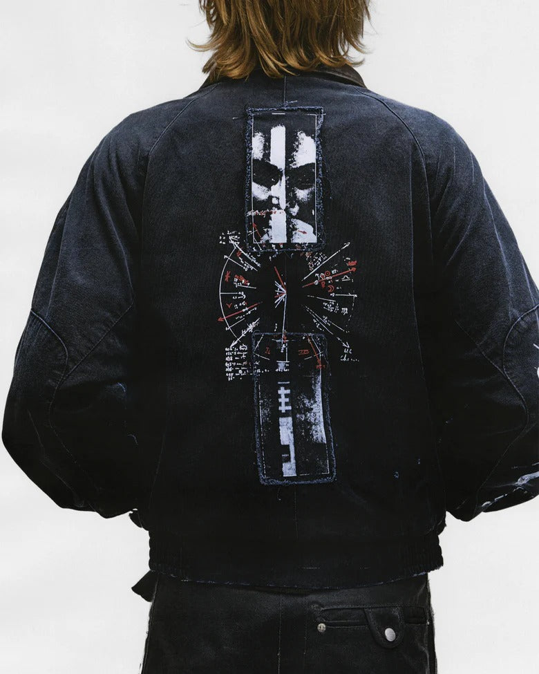 Black jacket worn by a person, showing the jacket's fit