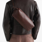 Brown bag worn by a person, showing the bag fit