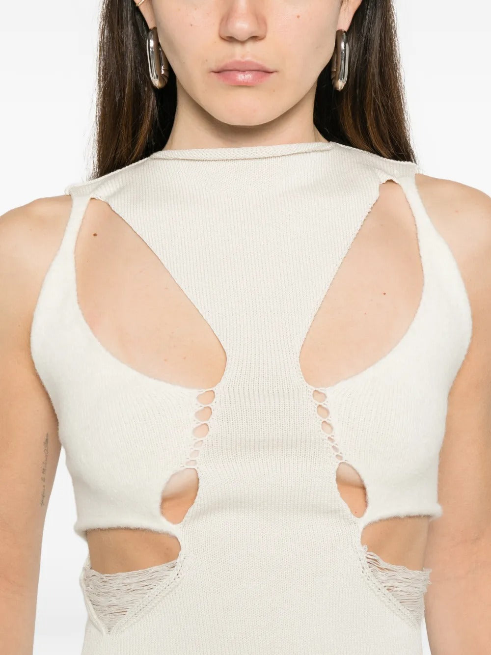 Close up white top,showing texture of the wool fabric