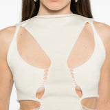 Close up white top,showing texture of the wool fabric