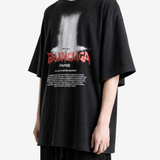 Black t-shirt worn by a person, showing the t-shirt fit