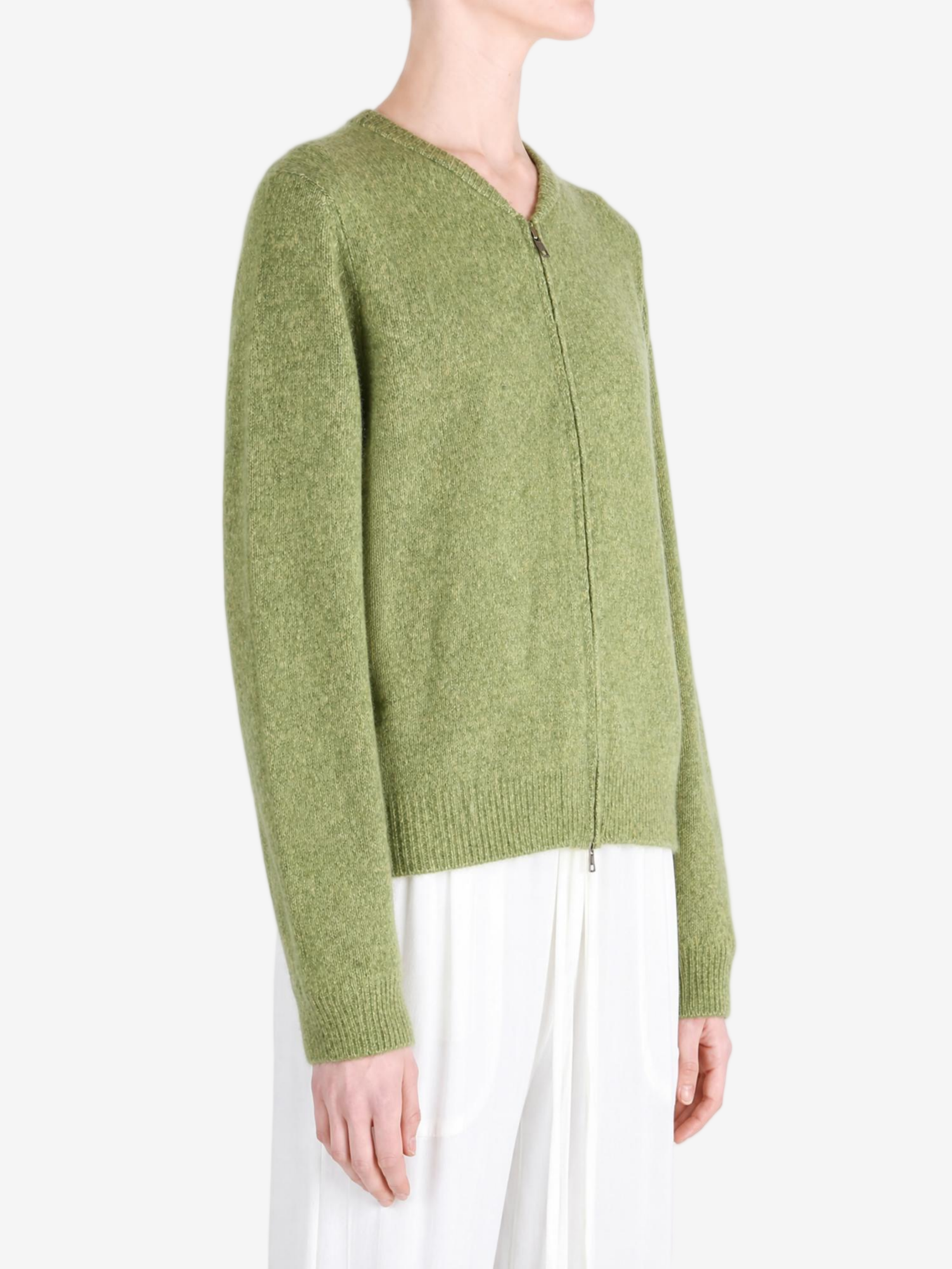 Green hoodie worn by a person, showing the hoodie fit