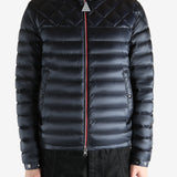 Black jacket worn by a person, showing the jacket fit