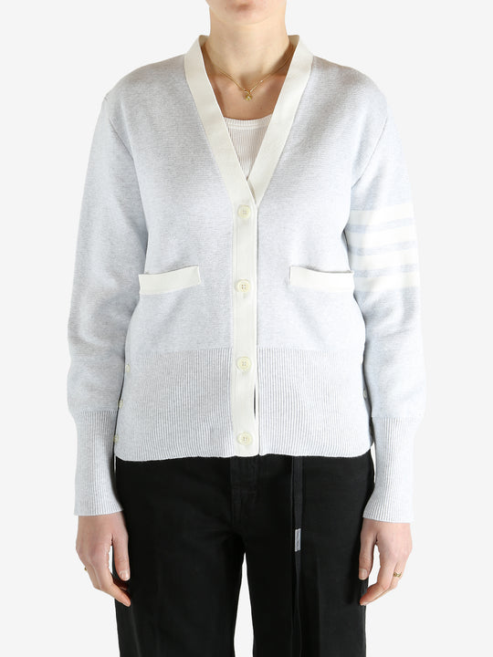 Gray cardigan worn by a person, showing the cardigan fit