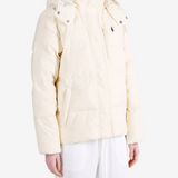 Tan jacket worn by a person, showing the jacket fit