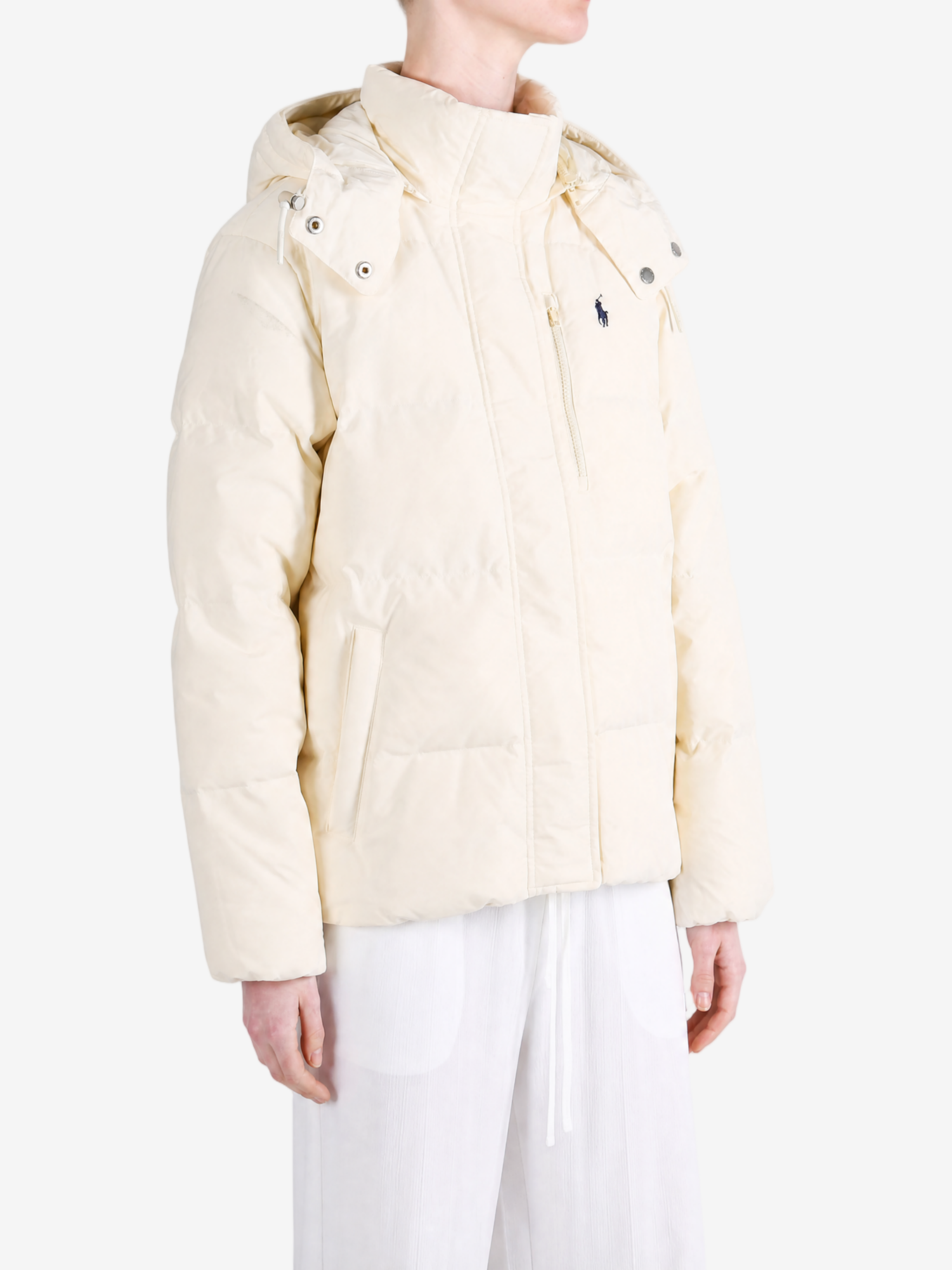 Tan jacket worn by a person, showing the jacket fit