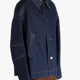 Navy jacket worn by a person, showing the jacket's fit