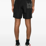Black shorts worn by a person, showing the shorts's fit