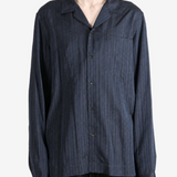 Navy jacket worn by a person, showing the jacket fit