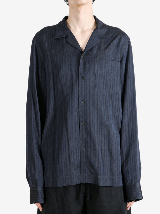 Navy jacket worn by a person, showing the jacket fit