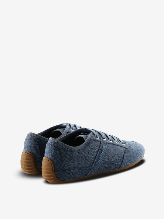 Blue sneakers, back view