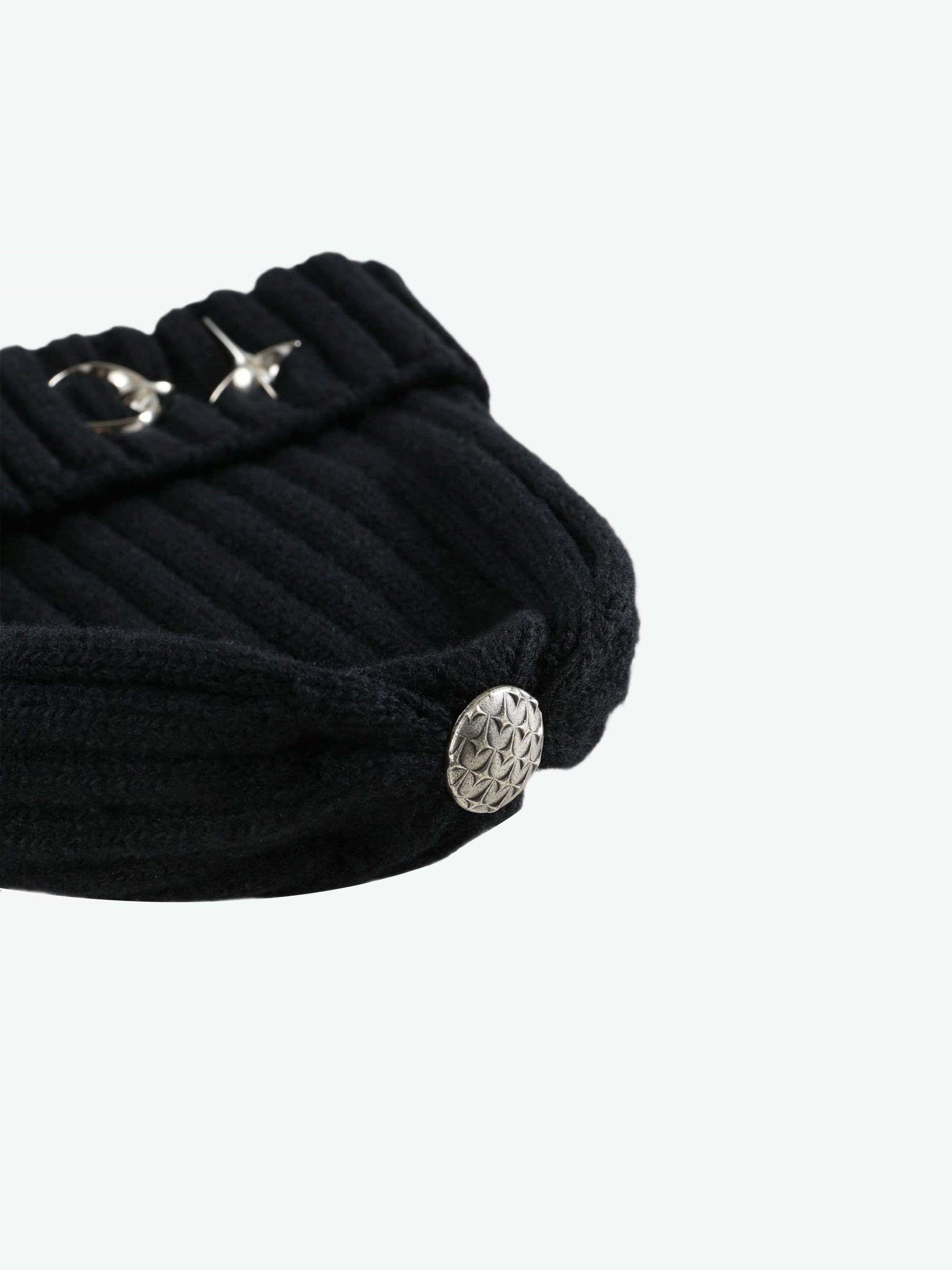 Black hat,side view showing wool fabric