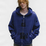 Blue hoodie worn by a person, showing the hoodie's fit