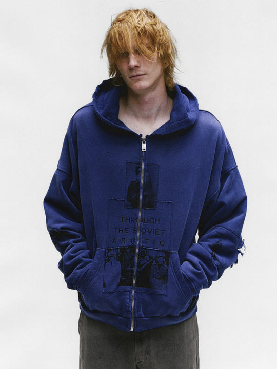Blue hoodie worn by a person, showing the hoodie's fit