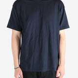 Navy t-shirt worn by a person, showing the t-shirt's fit