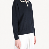 Navy shirt worn by a person, showing the shirt fit