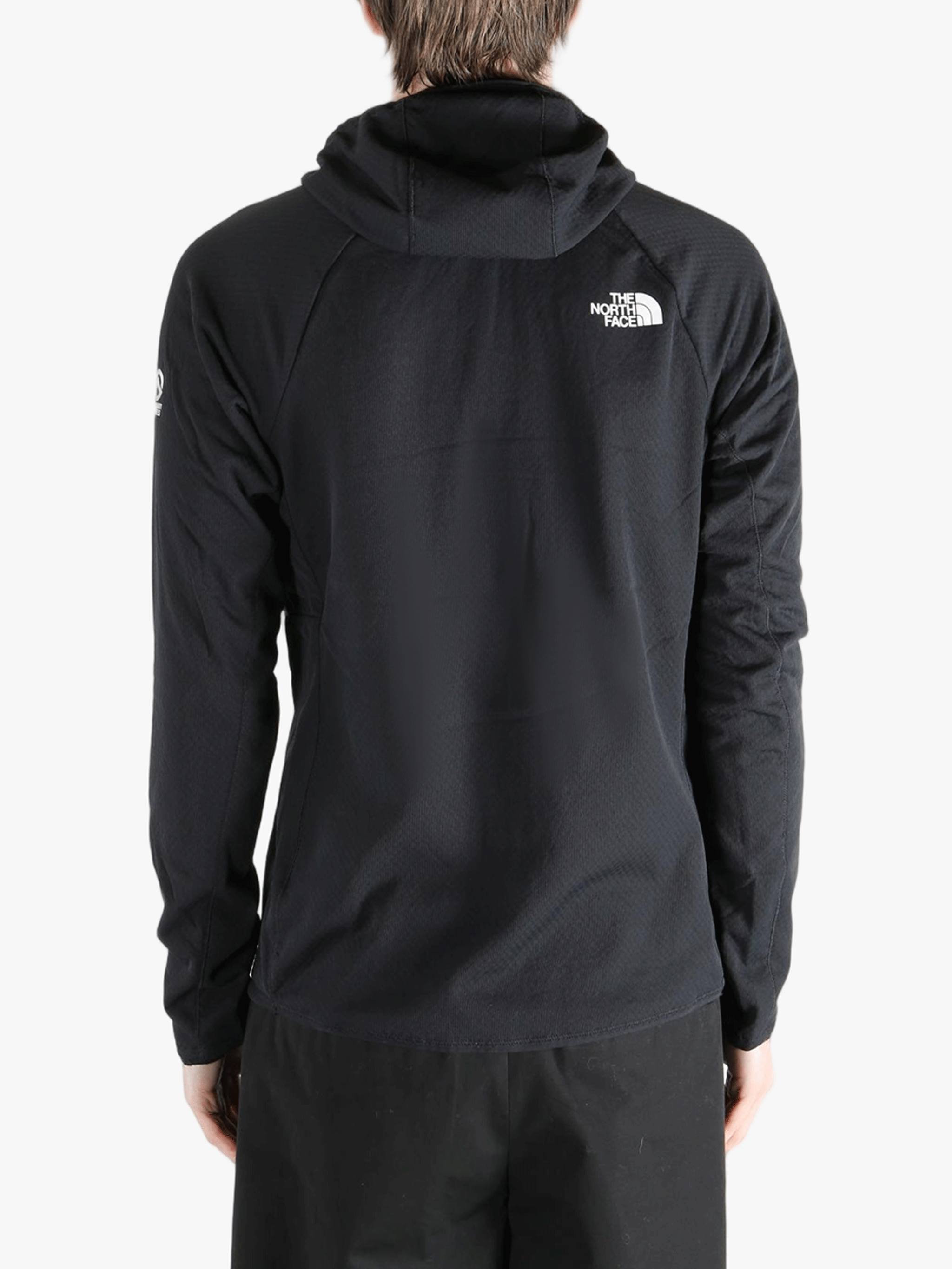 Black hoodie worn by a person, showing the hoodie's fit