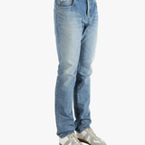 Blue jean worn by a person, showing the fit