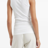 White tops worn by a person, showing the tops fit