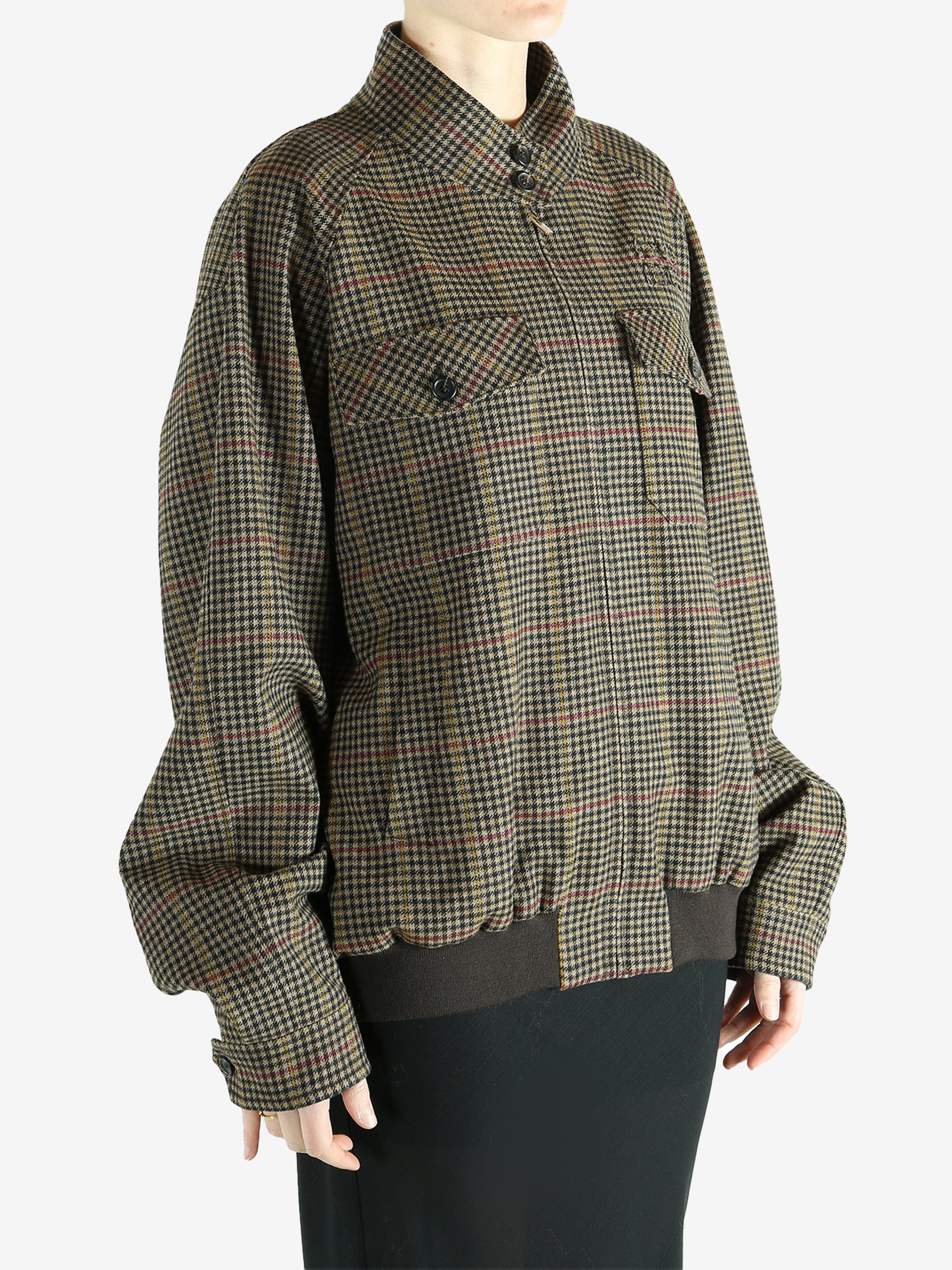 Brown jacket worn by a person, showing the jacket's fit