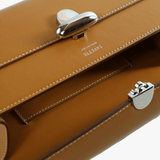 Close up of brown bag, showing texture of the leather fabric
