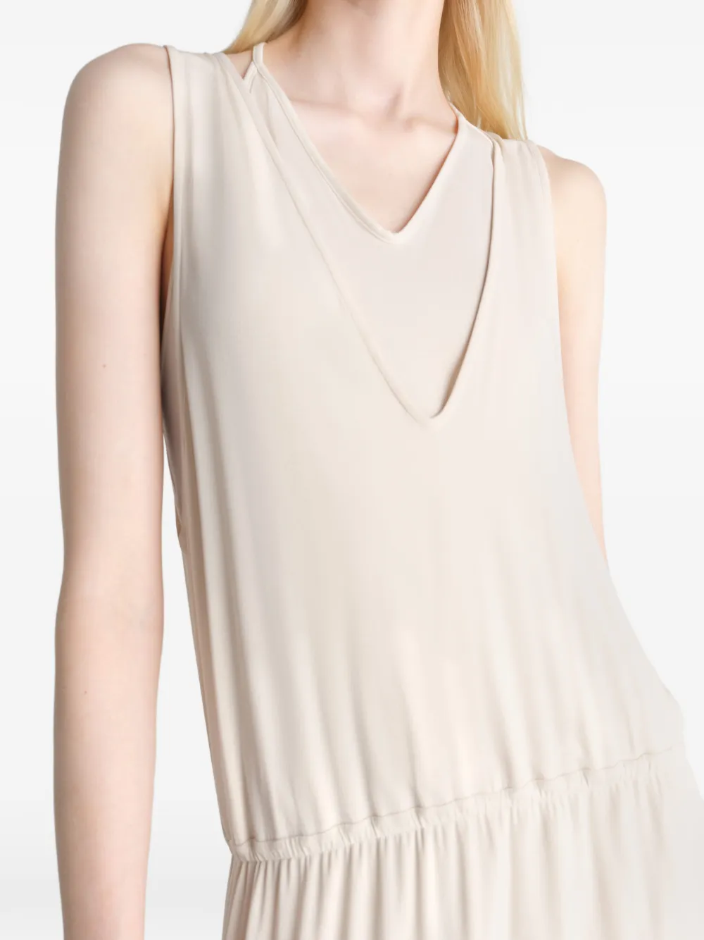 Close up of tan dress , showing texture of the Viscose and Elastane fabric