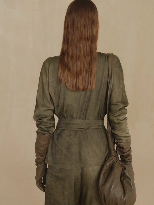 Green pants, full body view