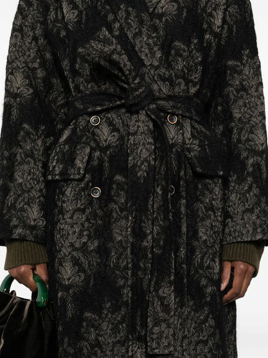 Close up of black coats, showing texture of the angora fabric