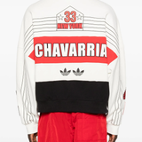 White top worn by a person, showing the top fit