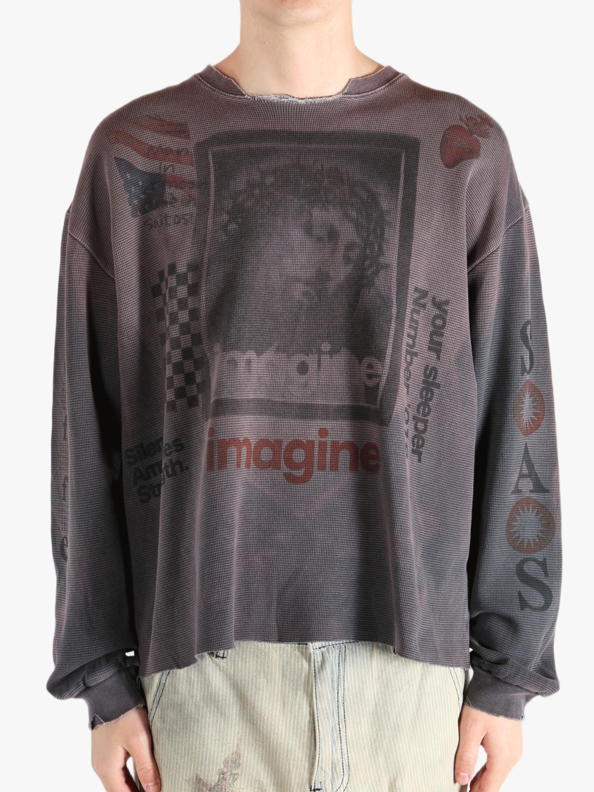 Grey top worn by a person, showing the top's fit