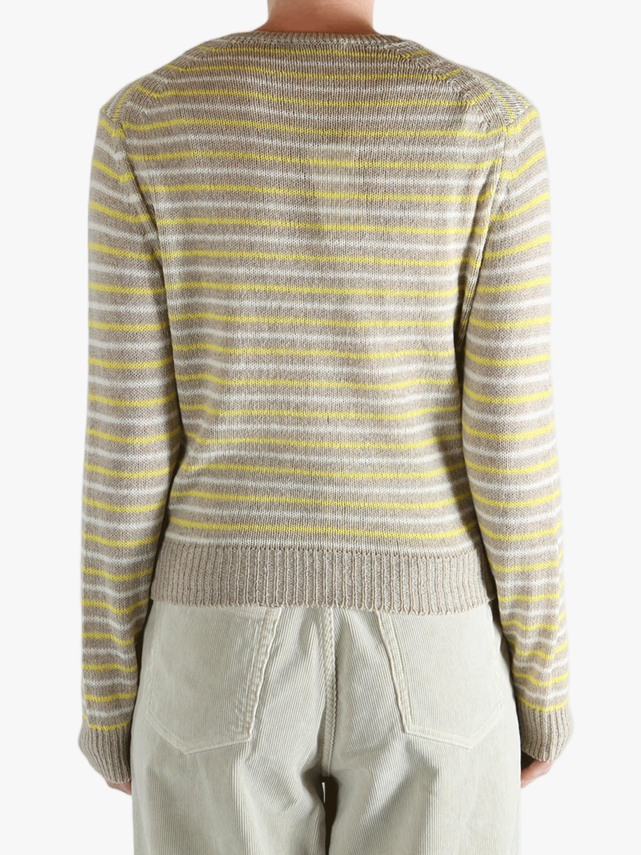 Yellow knitwear worn by a person, showing the knitwear fit