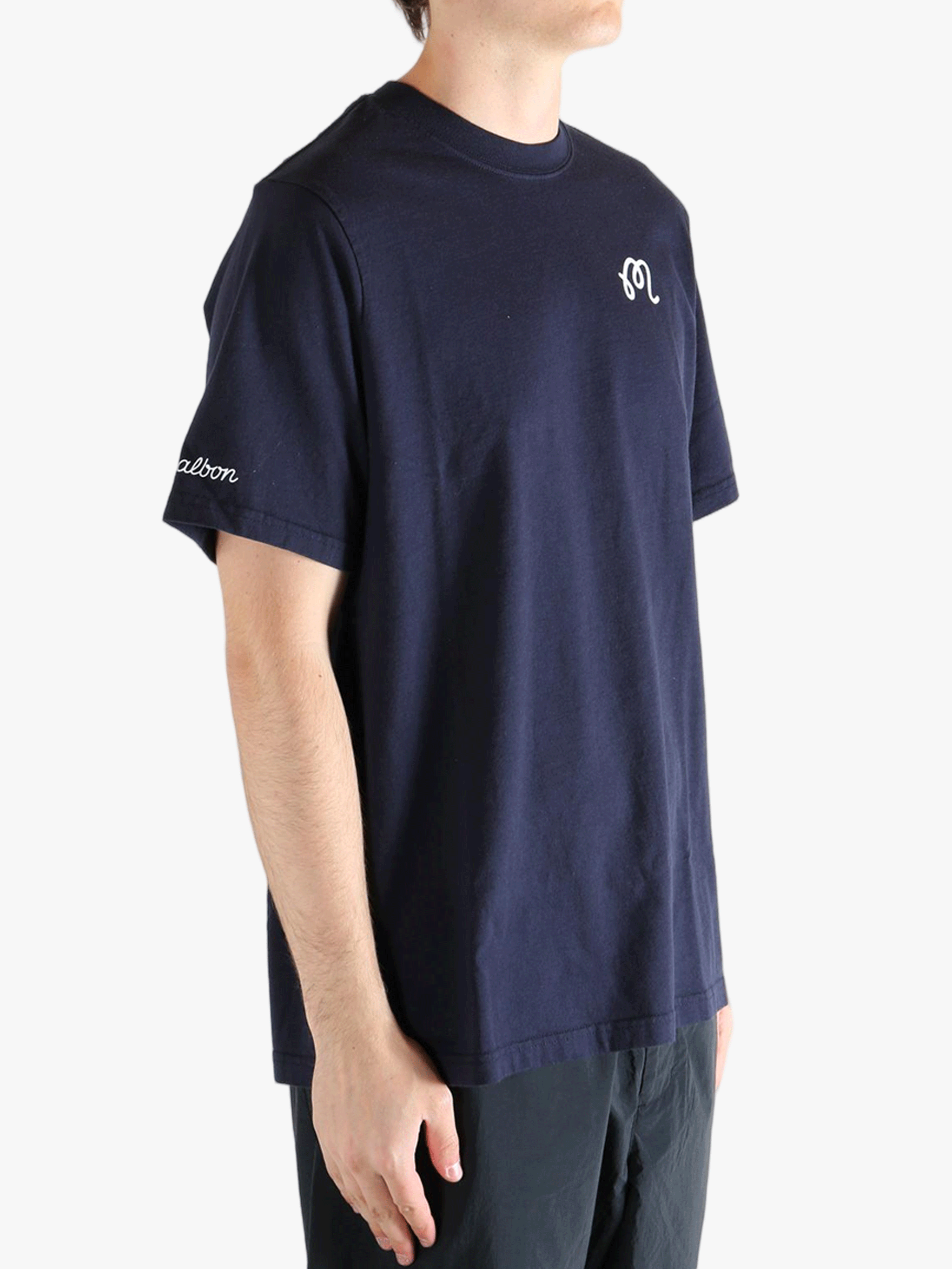 Navy t-shirt worn by a person, showing the t-shirt's fit