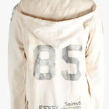 White sweats worn by a person, showing the sweats' fit